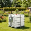 Cuve IBC 1000 litres – blanc – palette acier ou plastique – renouvelé - au jardin